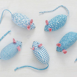 A hand-sewn catnip mouse play toy for cats